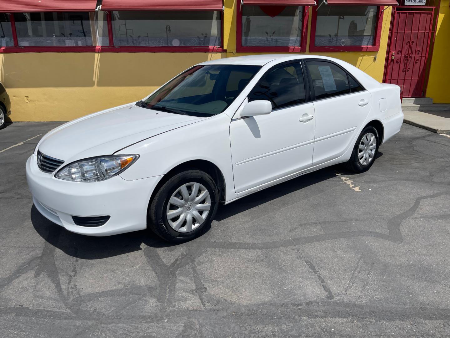 2005 Super White II /Gray Cloth Toyota Camry LE (4T1BE32K55U) with an 2.4L I4 engine, Automatic transmission, located at 801 South State Street, Salt Lake City, UT, 84111, (801) 328-0098, 40.751953, -111.888206 - Life is crazy. Now is the time to buy! All of our prices are just dollars above our cost. These prices will change as soon as life isn't so crazy. So please call or come in. We are here to save you a lot of money! Our service department is OPEN DAILY to help with any of your service needs. P - Photo#0